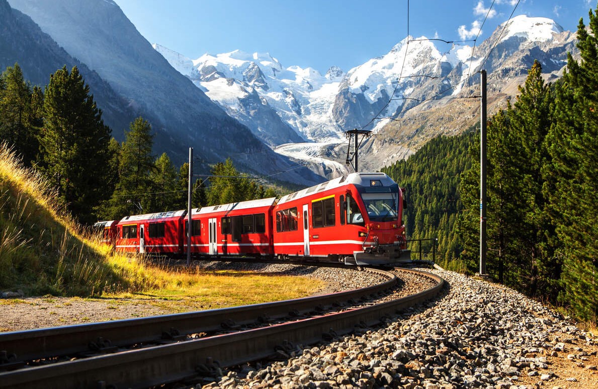 A-Red-Train-Is-Passing-Throgh-Nature-On-Railways